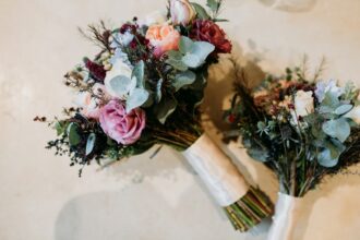 pink and orange flower bouquet on white surface